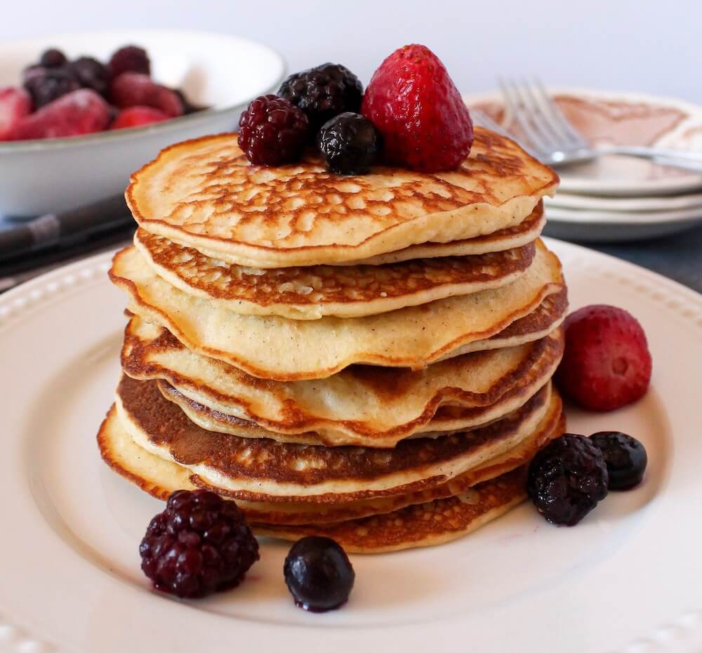 Berries on top of keto almond flour pancakes