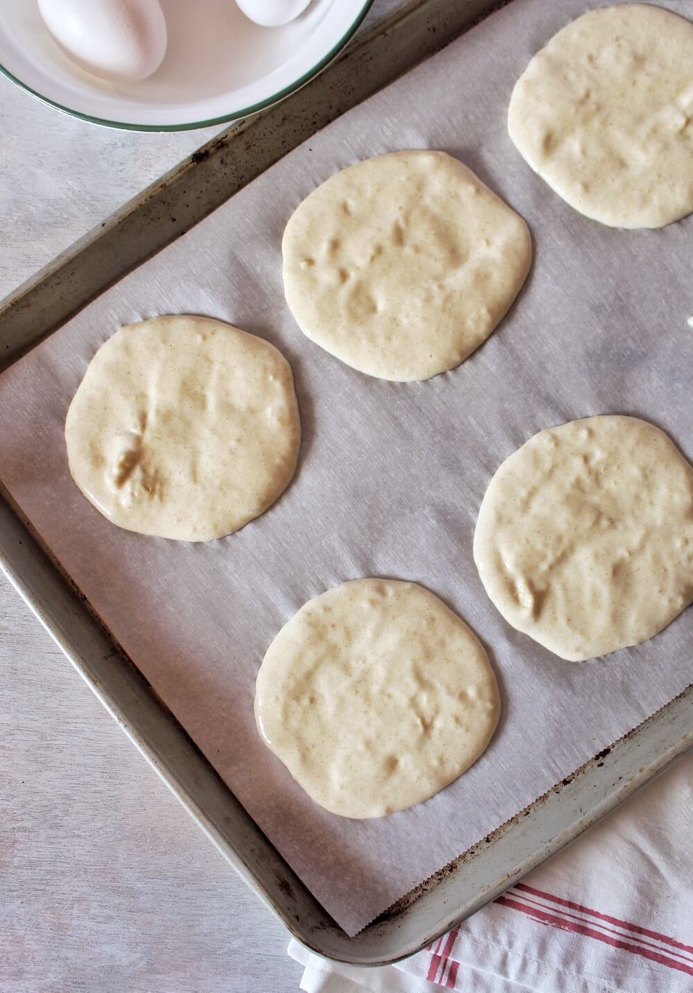 Keto Cloud Bread On Baking Sheet With Parchment Paper