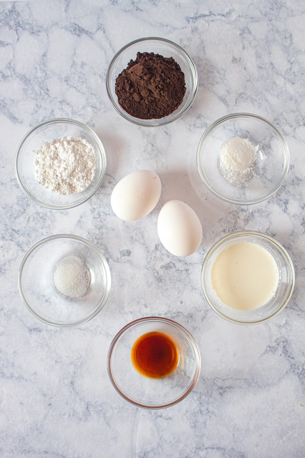 Ingredients for our delicious keto lava cake recipe prepped and laid out on the counter.