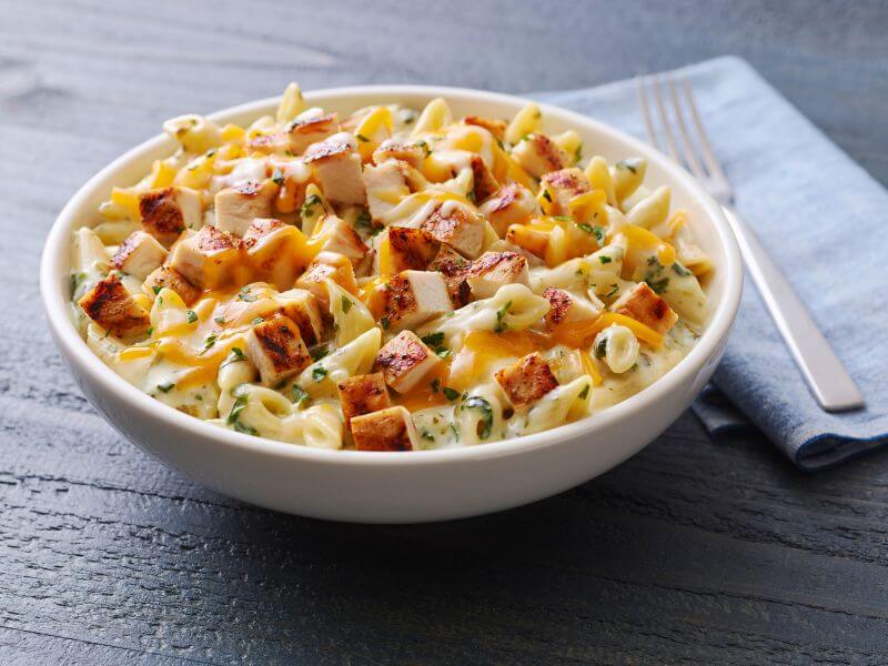 Image of Applebee's chicken pasta with creamy sauce, a high-carbohydrate dish that is not suitable for a keto-friendly diet.